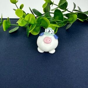 Vintage Mini Pig Figurine wearing hat
